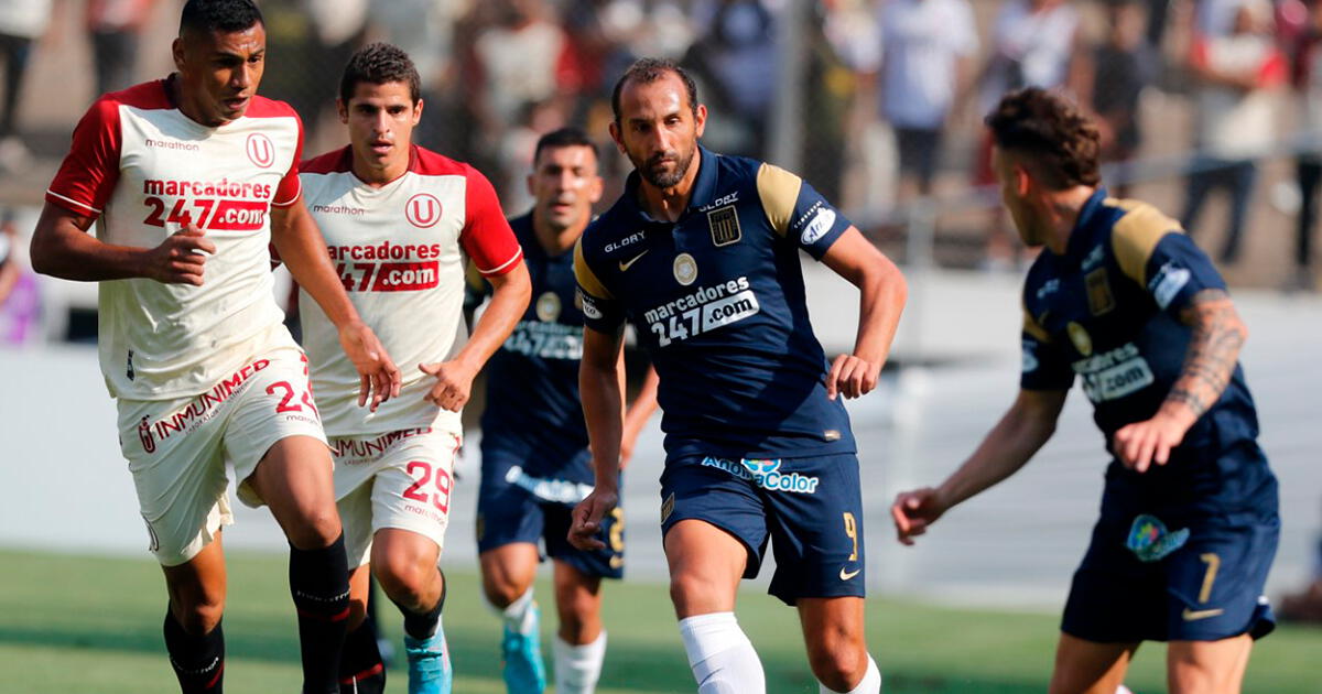 How did Hernán Barcos do playing against Universitario wearing the Alianza Lima jersey?