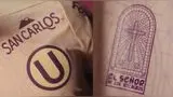 Universitario y una llamativa camiseta del mes morado.