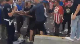Real Madrid vs. Atlético Madrid: hinchas se agarran a golpes en el estadio San Siro |VIDEO 