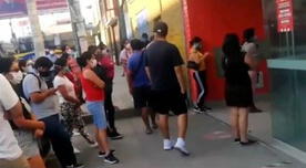 Largas colas y caos se vivió en reapertura de local de comida rápida en SJL [VIDEO]
