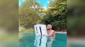 Daniel Alves nada con su nueva consola PlayStation 5 en una piscina - VIDEO