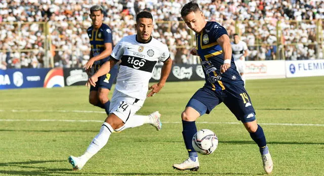 Olimpia ante Sportivo Trinidense.