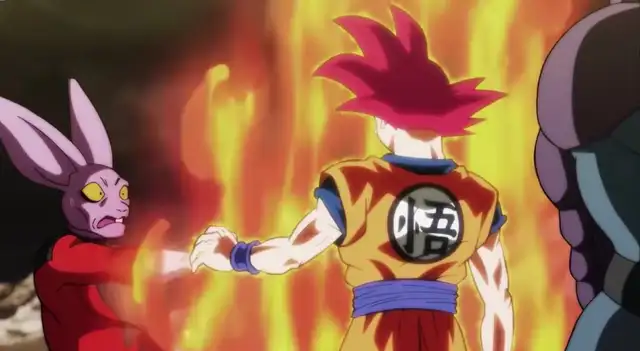 Gokú fase dios detiene el golpe del guerrero del universo 11.    Imagen: Toei Animation   