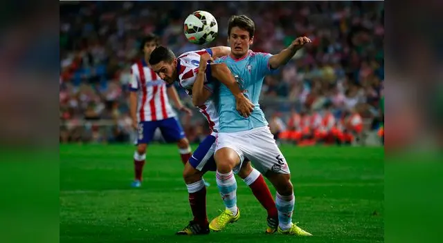Atlético de Madrid vs. Celta de Vigo: Koke disputa el balón ante Radoja. Atlético de Madrid vs. Celta de Vigo: Koke disputa el balón ante Radoja.
