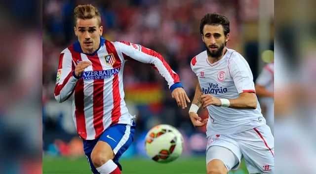 Atlético de Madrid vs. Sevilla: Antoine Griezmann a la busca del balón con Nicolás Pareja.