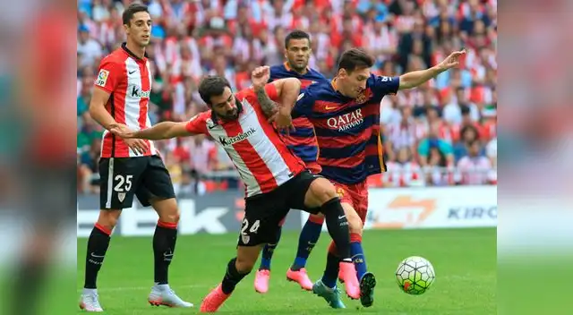 Barcelona vs. Athletic de Bilbao: Lionel Messi disputa el balón con Mikel Balenziaga.