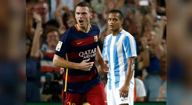 Barcelona vs. Málaga: Thomas Vermaelen celebra efusivamente su gol ante la desazón del venezolano Rosales. Barcelona vs. Málaga: Thomas Vermaelen celebra efusivamente su gol ante la desazón del venezolano Rosales.