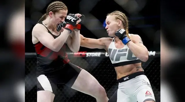 Valentina Shevchenko le mete un derechazo a Sarah Kaufman. Valentina Shevchenko le mete un derechazo a Sarah Kaufman.