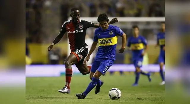 Luis Advíncula marca a Nicolás Lodeiro en el Boca Juniors vs. Newell's Old Boys. Luis Advíncula marca a Nicolás Lodeiro en el Boca Juniors vs. Newell's Old Boys.