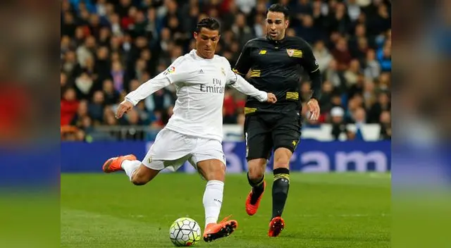 Cristiano Ronaldo alista el remate ante la presencia de Adil Rami. Cristiano Ronaldo alista el remate ante la presencia de Adil Rami.