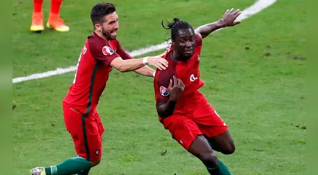 Éder celebra su gol a Francia con Joao Moutinho.