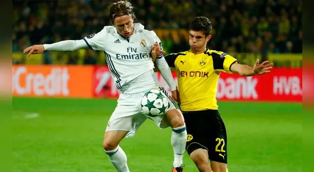 Christian Pulisic disputa un balón con Luka Modric en el Borussia Dortmund-Real Madrid. Christian Pulisic disputa un balón con Luka Modric en el Borussia Dortmund-Real Madrid.