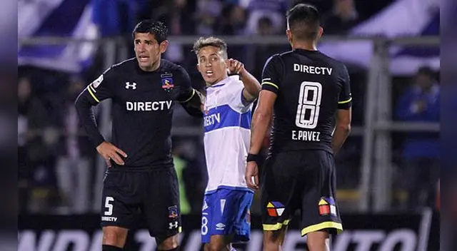 Diego Buonanotte discute con Esteban Pavez en pleno clásico chileno.