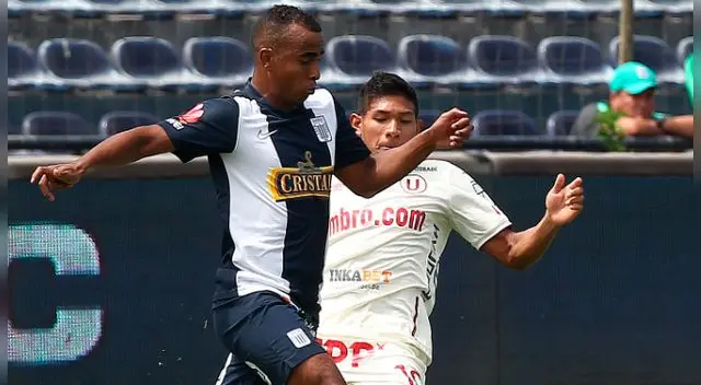 Luis Trujillo disputa un balón con Édison Flores en un clásico. Luis Trujillo disputa un balón con Édison Flores en un clásico.