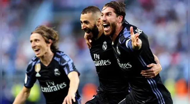 Sergio Ramos acudió a abrazar a Karim Benzema por su primer gol en el cotejo. Fuente: EFE Sergio Ramos acudió a abrazar a Karim Benzema por su primer gol en el cotejo. Fuente: EFE