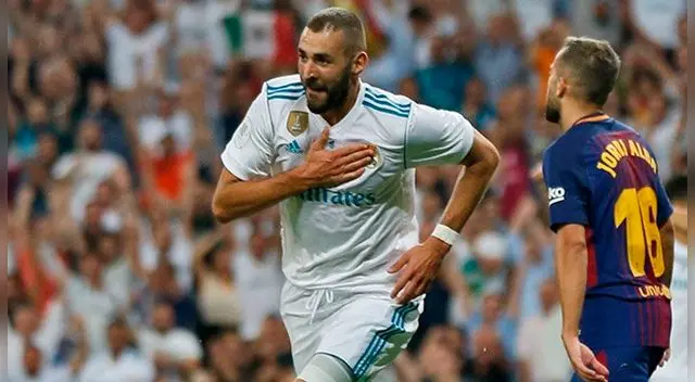 Karim Benzema celebra su gol ante la desazón de Jordi Alba. Karim Benzema celebra su gol ante la desazón de Jordi Alba.
