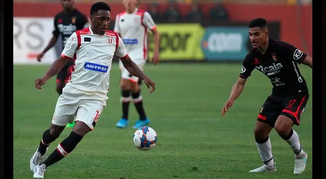 Luis Tejada y Anderson Santamaría, durante un Universitario vs. Melgar.