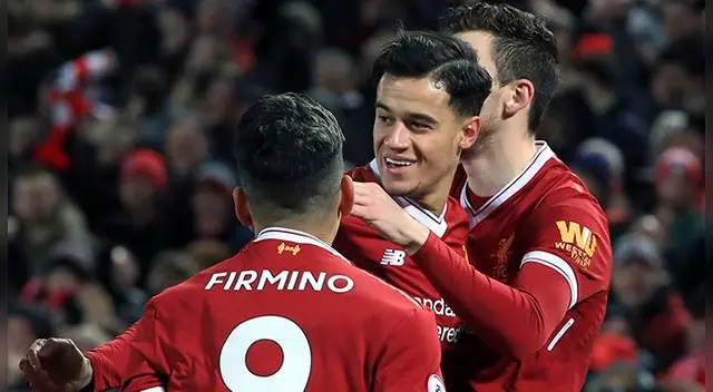 Philippe Coutinho celebra un gol junto a sus compañeros del Liverpool. Philippe Coutinho celebra un gol junto a sus compañeros del Liverpool.