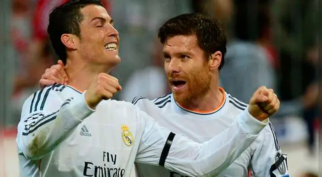 Xabi Alonso y Cristiano Ronaldo jugaron en Real Madrid en el 2014. Foto: EFE
