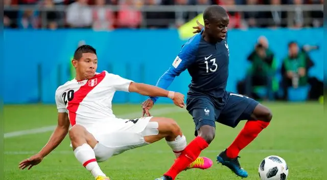 Edison Flores y N'Golo Kanté en escena.