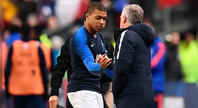 Kylian Mbappé y Didier Deschamps.