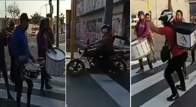 Repartidor de delivery se puso a bailar al ritmo de la banda musical