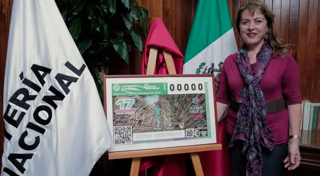 Lotería Nacional develó billete del Sorteo Superior sobre Parques Mágicos.   