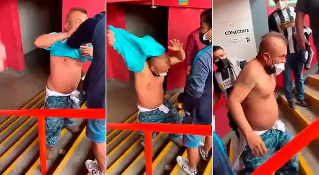 Personas le quitaron camiseta a hincha de Sporting Cristal dentro del Nacional Personas le quitaron camiseta a hincha de Sporting Cristal dentro del Nacional