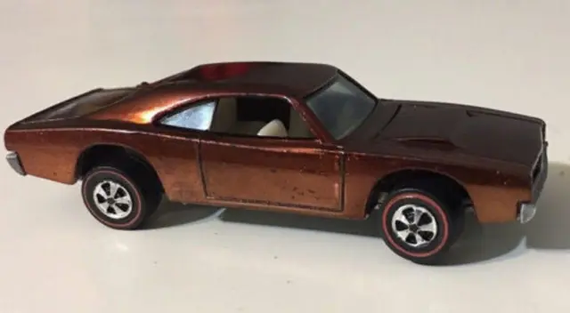 7. El Brown Custom Charger de 1969 tiene un valor de $ 13.000 para los coleccionistas. 7. El Brown Custom Charger de 1969 tiene un valor de $ 13.000 para los coleccionistas.
