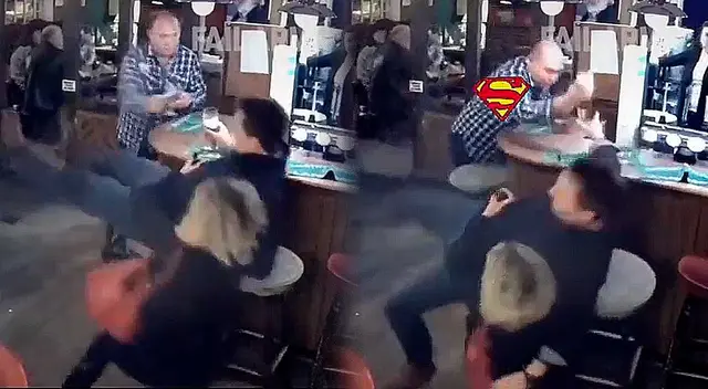 Hombre salvó vaso de cerveza de dos personas que terminan en el suelo: