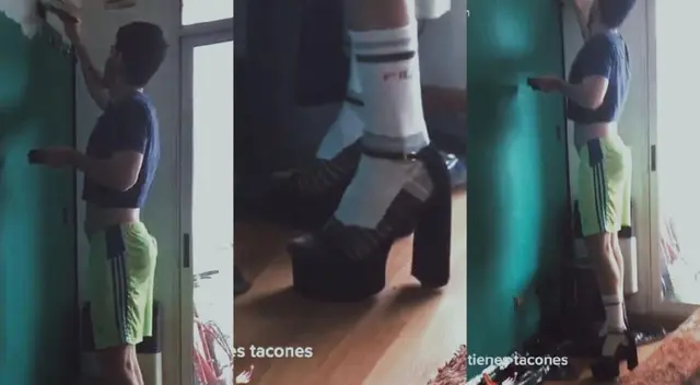 Hombre usa tacones altos para pintar su pared en vez de una escalera Hombre usa tacones altos para pintar su pared en vez de una escalera