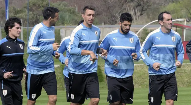 Muslera, Suárez y Godín.