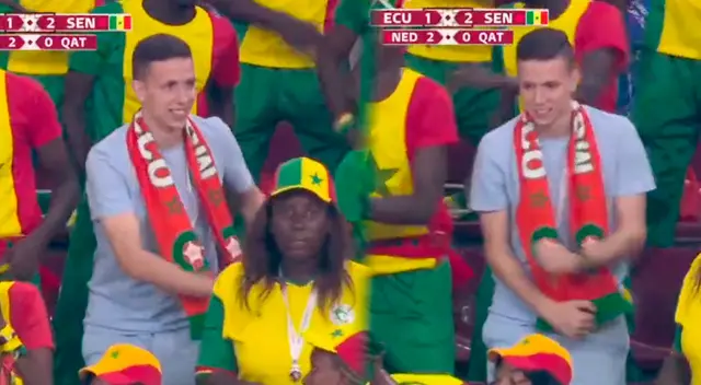 ¡Qué tal ritmo! Marroquí baila con la hincha de Senegal. ¡Qué tal ritmo! Marroquí baila con la hincha de Senegal.