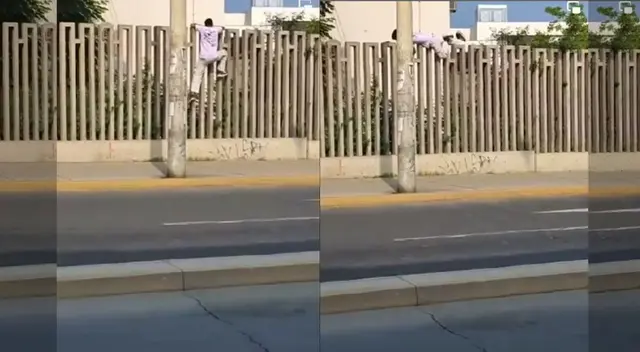 Este joven no le importó el peligro de trepar esta pared para rendir su examen.