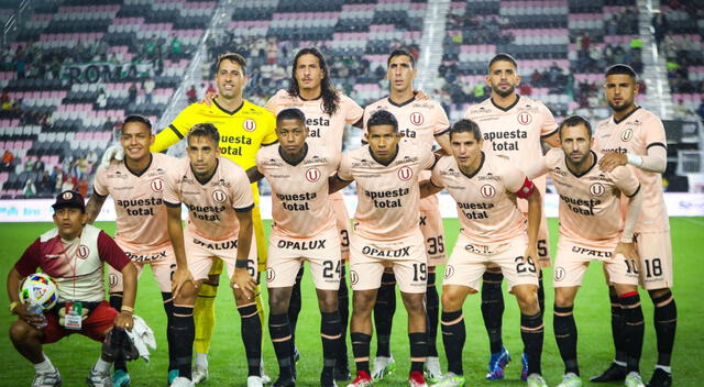 Universitario, Atlético Nacional
