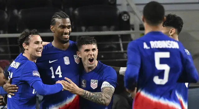 Haji Wright celebra su doblete ante Jamaica.