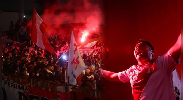 Hinchas peruanos destruyen cerco de seguridad