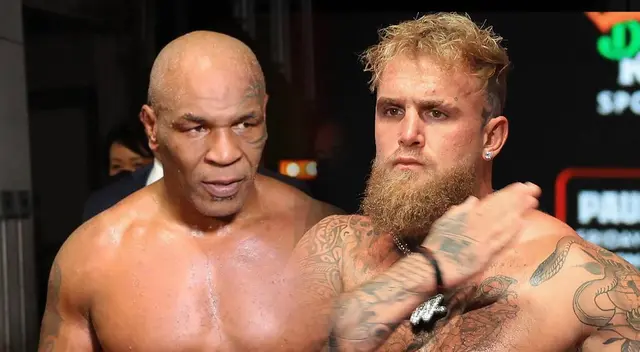 Mike Tyson y Jake Paul saltan al ring para la pelea del año.