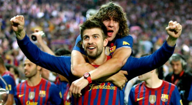 Carles Puyol y Gerard Piqué