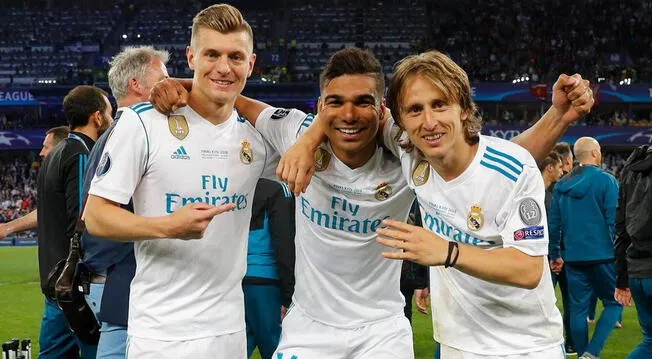 Toni Kroos, Casemiro y Luka Modric tras ganar el título de la Champions League 2018.