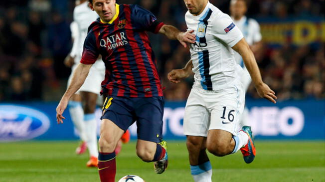 Sergio Aguero y Lionel Messi en el duelo Manchester City vs. Barcelona en la Champions 2013-14.