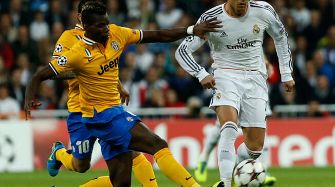 Paul Pogba enfrentando a Cristiano Ronaldo en un Real Madrid vs. Juventus de la Champions 2013-14.