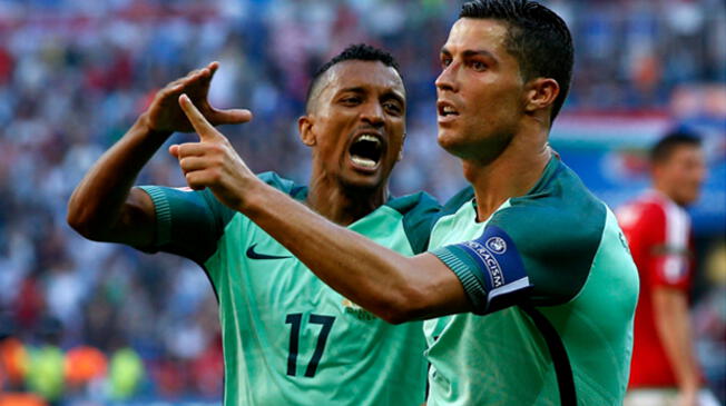 Cristiano Ronaldo celebra su gol a Hungría junto a Nani.