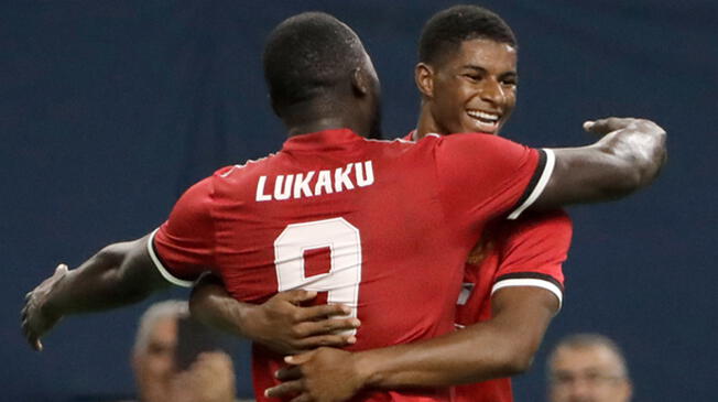 Lukaku y Rashford celebran el gol del segundo al City.