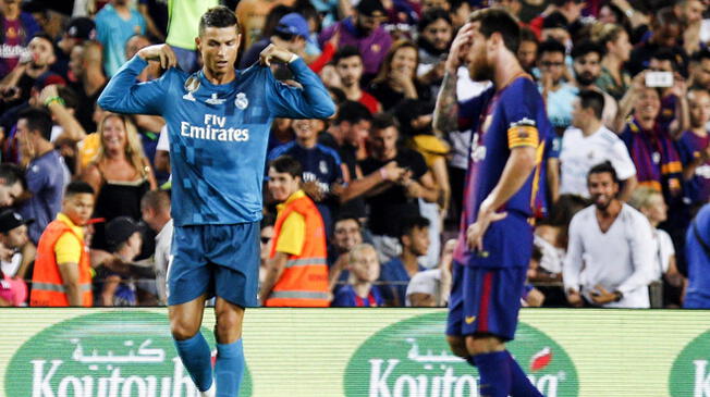 Cristiano Ronaldo celebra mientras Lionel Messi se lamenta.