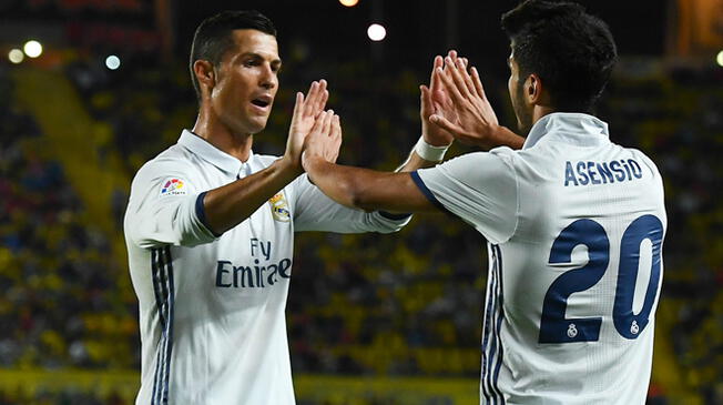 Cristiano Ronaldo celebra un gol con Marco Asensio.