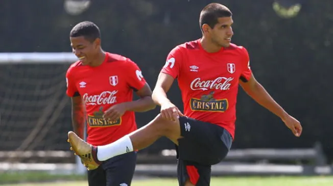 Andy Polo y Luis Abram en un entrenamiento de la Selección Peruana.