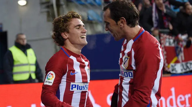 Diego Godín y Antoine Griezmann celebrando un gol del Atlético.