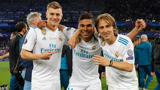 Toni Kroos, Casemiro y Luka Modric tras ganar el título de la Champions League 2018.