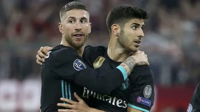 Sergio Ramos y Marco Asensio celebran un gol del Real Madrid.